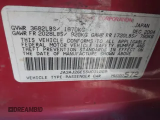 2005 Mitsubishi Lancer ES with VIN JA3AJ26E55U031209, listed as a IAAI auction lot 41541470 with 290,334 mi miles. Bid and sale history available at carsss.com. Image 9.