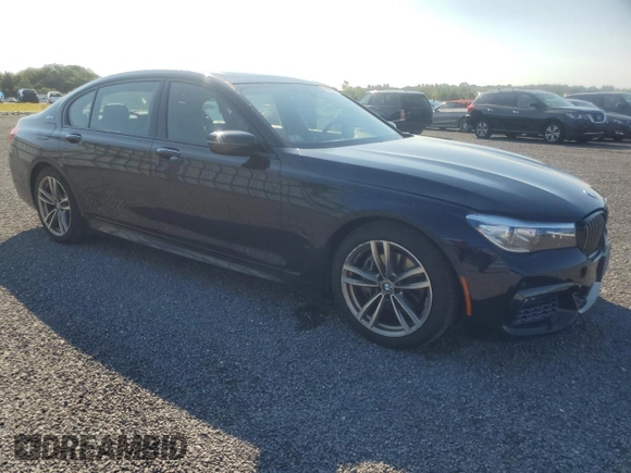 2018 BMW 7 Series 740e xDrive iPerformance with VIN WBA7J2C52JG938439, listed as a Copart auction lot 69452044 with 38,451 mi miles and Salvage Title. Bid and sale history available at carsss.com. Image 4.