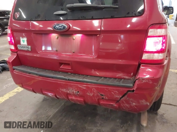 2011 Ford Escape XLT с VIN 1FMCU9D7XBKB14572, выставлен на аукционе IAAI как лот 40920474 с пробегом 154 888 миль миль и . История ставок и продаж доступна на DreamBid. Изображение 6.