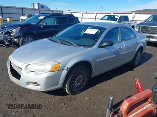 2004 Chrysler Sebring Touring with VIN 1C3EL56RX4N110776, listed as a IAAI auction lot 41669015 with 93,890 mi miles and . Bid and sale history available at DreamBid. Image 2.