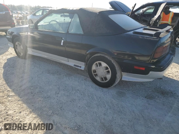 1989 Chevrolet Cavalier with VIN 1G1JF31W1K7190840, listed as a Copart auction lot 77747934 with Not Provided miles and Salvage Title. Bid and sale history available at DreamBid. Image 2.
