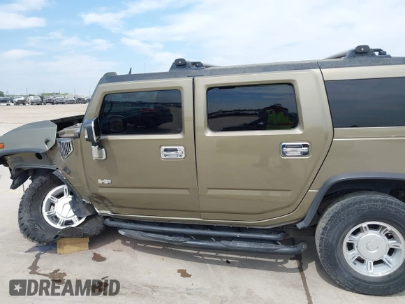2006 Hummer H2 with VIN 5GRGN23U56H102574, listed as a IAAI auction lot 41955539 with 202,102 mi miles. Bid and sale history available at carsss.com. Image 15.