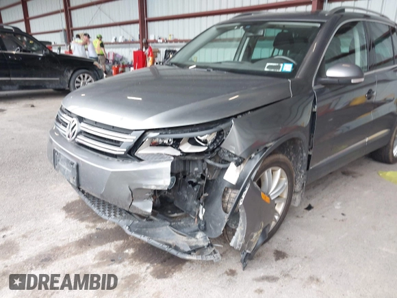 2016 Volkswagen Tiguan SE with VIN WVGBV7AX7GW526904, listed as a IAAI auction lot 42590816 with 73,758 mi miles and . Bid and sale history available at DreamBid. Image 6.