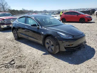 2020 Tesla Model 3 Standard Range Plus with VIN 5YJ3E1EA4LF784677, listed as a Copart auction lot 50515825 with Not Provided miles and Salvage Title. Bid and sale history available at DreamBid. Image 4.