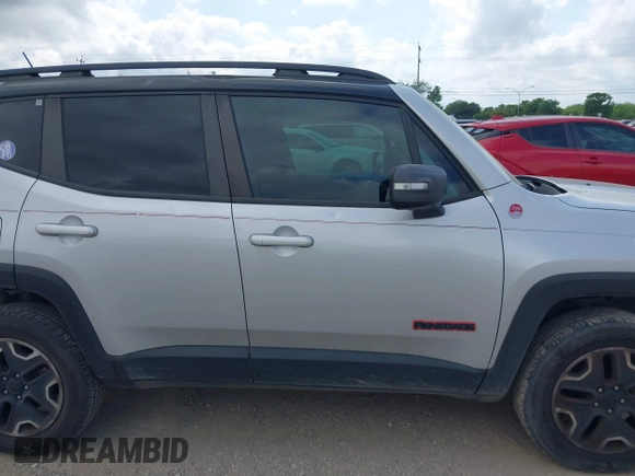 2017 Jeep Renegade Trailhawk with VIN ZACCJBCB6HPE63267, listed as a IAAI auction lot 42027156 with 64,899 mi miles and . Bid and sale history available at DreamBid. Image 13.