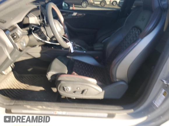 2021 Audi RS 5 z VIN WUANWAF5XMA903675, wystawiony jako Copart lot #86527284 z przebiegiem 27 445 mil mil oraz Szkoda całkowita • Salvage title. Historia ofert i sprzedaży dostępna na DreamBid. Obrazek 7.