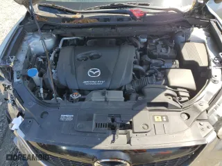 2014 Mazda CX-5 Touring with VIN JM3KE4CY9E0415402, listed as a Copart auction lot 56576114 with 181,719 mi miles and Salvage Title. Bid and sale history available at carsss.com. Image 12.