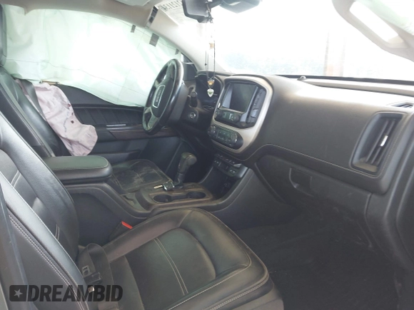 2021 GMC Canyon 4WD Denali with VIN 1GTG6EEN5M1102747, listed as a IAAI auction lot 42121134 with 60,412 mi miles and . Bid and sale history available at DreamBid. Image 5.