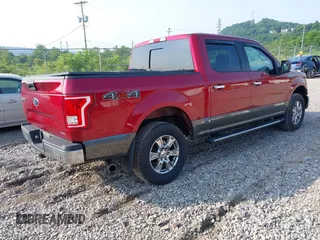 2015 Ford F-150 XLT with VIN 1FTEW1EF7FFC13203, listed as a IAAI auction lot 42479929 with 76,123 mi miles and . Bid and sale history available at DreamBid. Image 4.