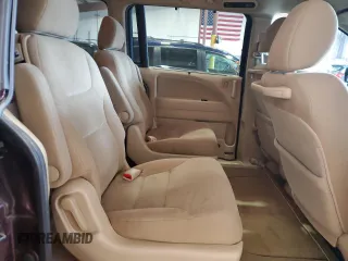 2010 Honda Odyssey EX z VIN 5FNRL3H47AB036925, wystawiony jako Copart lot #57555365 z przebiegiem 178 790 mil mil oraz Szkoda całkowita • Salvage title. Historia ofert i sprzedaży dostępna na DreamBid. Obrazek 11.