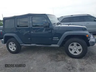 2018 Jeep Wrangler JK Unlimited Sport with VIN 1C4BJWDG5JL858936, listed as a IAAI auction lot 39953617 with 75,865 mi miles. Bid and sale history available at carsss.com. Image 13.