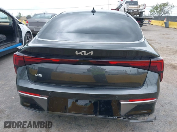 2025 Kia K5 LXS z VIN KNAG24J77S5316431, wystawiony jako IAAI lot #42072969 z przebiegiem 14 413 mil mil oraz . Historia ofert i sprzedaży dostępna na DreamBid. Obrazek 17.