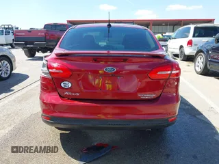 2015 Ford Focus Titanium with VIN 1FADP3J29FL230664, listed as a IAAI auction lot 41870083 with 125,578 mi miles and . Bid and sale history available at DreamBid. Image 16.