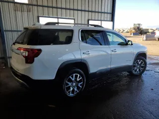 2023 GMC Acadia SLT with VIN 1GKKNUL4XPZ150997, listed as a Copart auction lot 88820265 with 51,516 mi miles and Clean Title. Bid and sale history available at DreamBid. Image 3.