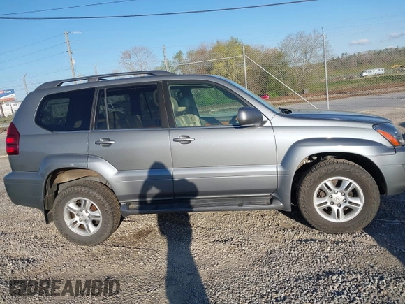 2004 Lexus GX 470 with VIN JTJBT20X440045714, listed as a IAAI auction lot 42026723 with 237,762 mi miles. Bid and sale history available at carsss.com. Image 14.