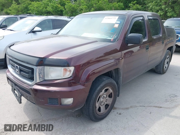 2009 Honda Ridgeline RT with VIN 5FPYK16239B109716, listed as a IAAI auction lot 42068772 with 206,649 mi miles. Bid and sale history available at carsss.com. Image 19.