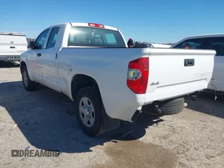 2014 Toyota Tundra 4WD Truck SR with VIN 5TFUM5F17EX055949, listed as a IAAI auction lot 41728783 with 107,019 mi miles. Bid and sale history available at carsss.com. Image 3.
