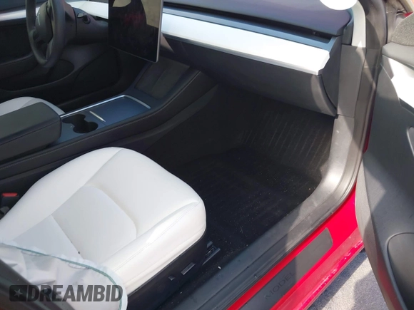 2023 Tesla Model 3 with VIN 5YJ3E1EA2PF588467, listed as a IAAI auction lot 42254921 with 11,217 mi miles and . Bid and sale history available at DreamBid. Image 5.