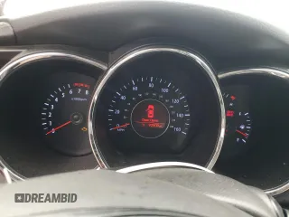 2013 Kia Optima EX z VIN 5XXGN4A7XDG169353, wystawiony jako Copart lot #55784855 z przebiegiem 92 809 mil mil oraz Szkoda całkowita • Salvage title. Historia ofert i sprzedaży dostępna na DreamBid. Obrazek 9.