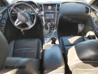 2019 Infiniti Q50 Luxe with VIN JN1EV7AP8KM514379, listed as a Copart auction lot 46948985 with 103,756 mi miles and Salvage title. Bid and sale history available at DreamBid. Image 8.