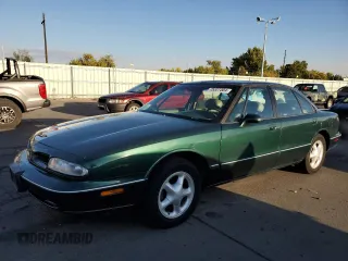 1996 Oldsmobile LSS z VIN 1G3HY52K1T4801881, wystawiony jako Copart lot #75327304 z przebiegiem 123 374 mil mil oraz Szkody całkowita. Historia ofert i sprzedaży dostępna na DreamBid. Obrazek 1.