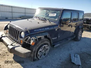 2013 Jeep Wrangler Unlimited Rubicon 10th Anniversary with VIN 1C4HJWFG7DL559539, listed as a Copart auction lot 81675894 with 99,425 mi miles and Salvage title. Bid and sale history available at DreamBid. Image 1.
