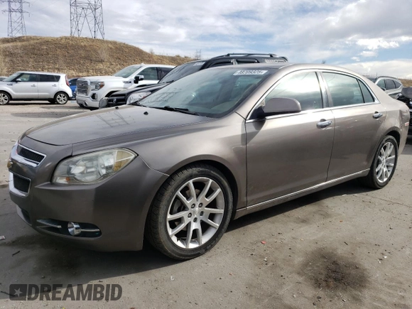 2012 Chevrolet Malibu LTZ with VIN 1G1ZG5E79CF280906, listed as a Copart auction lot 48709325 with 111,704 mi miles and Salvage Title. Bid and sale history available at DreamBid. Image 1.