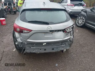 2014 Mazda 3 S Touring with VIN JM1BM1L30E1187539, listed as a IAAI auction lot 41974709 with 111,189 mi miles and . Bid and sale history available at DreamBid. Image 6.