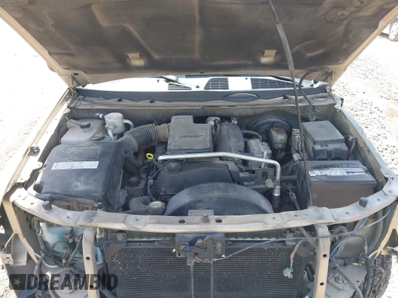 2005 GMC Envoy SLE with VIN 1GKDT13S252264932, listed as a IAAI auction lot 41981566 with 140,566 mi miles. Bid and sale history available at carsss.com. Image 10.