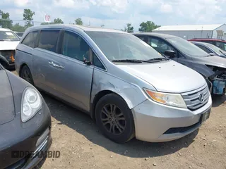 2012 Honda Odyssey EX-L with VIN 5FNRL5H66CB093813, listed as a IAAI auction lot 42583774 with 248,720 mi miles and . Bid and sale history available at DreamBid. Image 1.