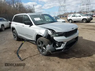 2023 Jeep Grand Cherokee Laredo with VIN 1C4RJHAG2PC660418, listed as a IAAI auction lot 41693879 with 4,295 mi miles and . Bid and sale history available at DreamBid. Image 17.