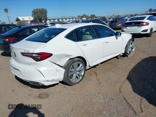 2021 Acura TLX Technology z VIN 19UUB5F48MA002731, wystawiony jako IAAI lot #41820962 z przebiegiem 30 747 mil mil oraz . Historia ofert i sprzedaży dostępna na DreamBid. Obrazek 4.
