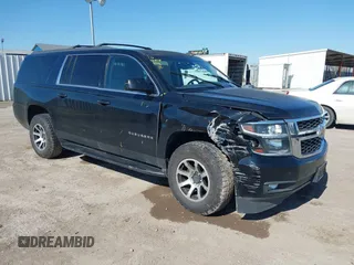 2015 Chevrolet Suburban LT z VIN 1GNSKJKC9FR126188, wystawiony jako IAAI lot #41672583 z przebiegiem 163 916 mil mil oraz . Historia ofert i sprzedaży dostępna na DreamBid. Obrazek 1.