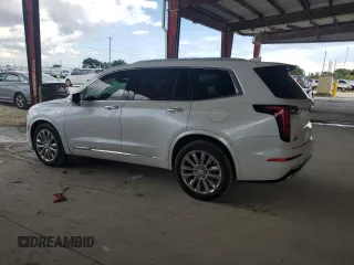 2023 Cadillac XT6 FWD Premium Luxury with VIN 1GYKPCRS4PZ103819, listed as a Copart auction lot 76279704 with 19,601 mi miles and Clean Title. Bid and sale history available at carsss.com. Image 2.