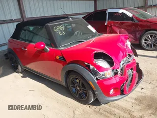 2014 MINI Convertible z VIN WMWZN3C59ET569675, wystawiony jako IAAI lot #42378842 z przebiegiem 70 352 mil mil oraz . Historia ofert i sprzedaży dostępna na DreamBid. Obrazek 1.