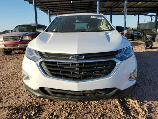 2020 Chevrolet Equinox LS z VIN 2GNAXHEV3L6149833, wystawiony jako Copart lot #57997985 z przebiegiem 64 304 mil mil oraz Szkoda całkowita • Salvage title. Historia ofert i sprzedaży dostępna na DreamBid. Obrazek 5.