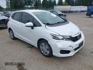 2020 Honda Fit LX z VIN 3HGGK5H46LM717552, wystawiony jako IAAI lot #42510170 z przebiegiem 53 410 mil mil oraz . Historia ofert i sprzedaży dostępna na DreamBid. Obrazek 1.