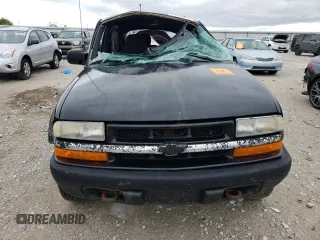 2000 Chevrolet Blazer LS z VIN 1GNCT18W9YK277871, wystawiony jako Copart lot #46158185 z przebiegiem Nie podano mil oraz Nie do naprawy • Non repairable. Historia ofert i sprzedaży dostępna na DreamBid. Obrazek 5.