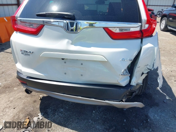 2018 Honda CR-V Touring with VIN 2HKRW2H93JH686298, listed as a IAAI auction lot 41979786 with 100,087 mi miles. Bid and sale history available at carsss.com. Image 6.