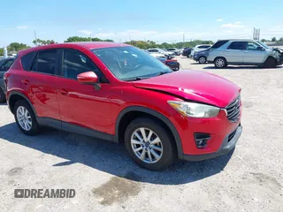 2016 Mazda CX-5 Touring with VIN JM3KE2CY6G0830409, listed as a IAAI auction lot 42049299 with 39,317 mi miles. Bid and sale history available at carsss.com. Image 1.