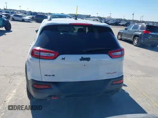 2018 Jeep Cherokee Trailhawk z VIN 1C4PJMBX8JD562994, wystawiony jako IAAI lot #41281555 z przebiegiem 86 702 mil mil oraz . Historia ofert i sprzedaży dostępna na DreamBid. Obrazek 17.