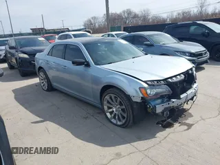 2013 Chrysler 300 with VIN 2C3CCAGT9DH590053, listed as a IAAI auction lot 41800253 with 136,596 mi miles. Bid and sale history available at carsss.com. Image 1.