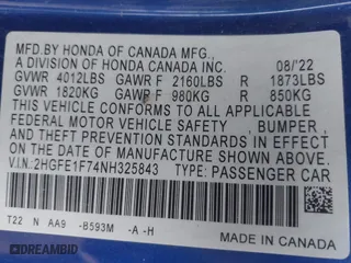 2022 Honda Civic Sedan EX with VIN 2HGFE1F74NH325843, listed as a IAAI auction lot 41116731 with 69,429 mi miles. Bid and sale history available at carsss.com. Image 9.