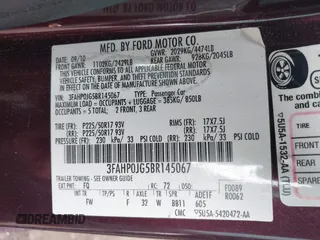 2011 Ford Fusion SEL with VIN 3FAHP0JG5BR145067, listed as a IAAI auction lot 41521268 with 245,430 mi miles. Bid and sale history available at carsss.com. Image 9.