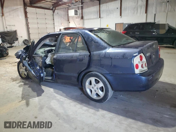 2000 Mazda Protege ES with VIN JM1BJ221XY0211385, listed as a Copart auction lot 48225605 with Not Provided miles and Non Repairable. Bid and sale history available at DreamBid. Image 2.
