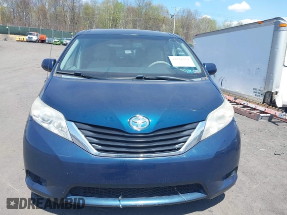 2012 Toyota Sienna LE AAS with VIN 5TDKK3DC7CS274726, listed as a IAAI auction lot 42126219 with 184,158 mi miles. Bid and sale history available at carsss.com. Image 12.