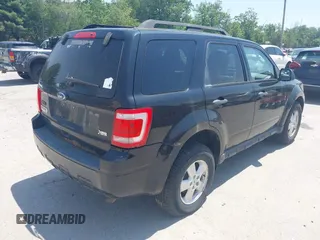 2010 Ford Escape XLT z VIN 1FMCU9DGXAKC43538, wystawiony jako IAAI lot #42410692 z przebiegiem 222 115 mil mil oraz . Historia ofert i sprzedaży dostępna na DreamBid. Obrazek 4.