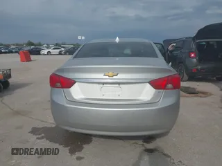 2014 Chevrolet Impala LT with VIN 2G1125S39E9313542, listed as a IAAI auction lot 41988420 with 227,093 mi miles and . Bid and sale history available at DreamBid. Image 16.