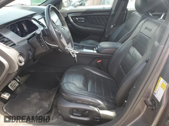 2014 Ford Taurus SHO with VIN 1FAHP2KT2EG152366, listed as a Copart auction lot 56479525 with 82,639 mi miles and Salvage title. Bid and sale history available at DreamBid. Image 7.
