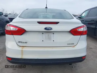 2013 Ford Focus S with VIN 1FADP3E20DL332636, listed as a IAAI auction lot 40917274 with 112,956 mi miles. Bid and sale history available at carsss.com. Image 16.